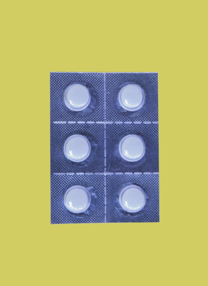 Panel of capsules medicine pills from doctor order photo