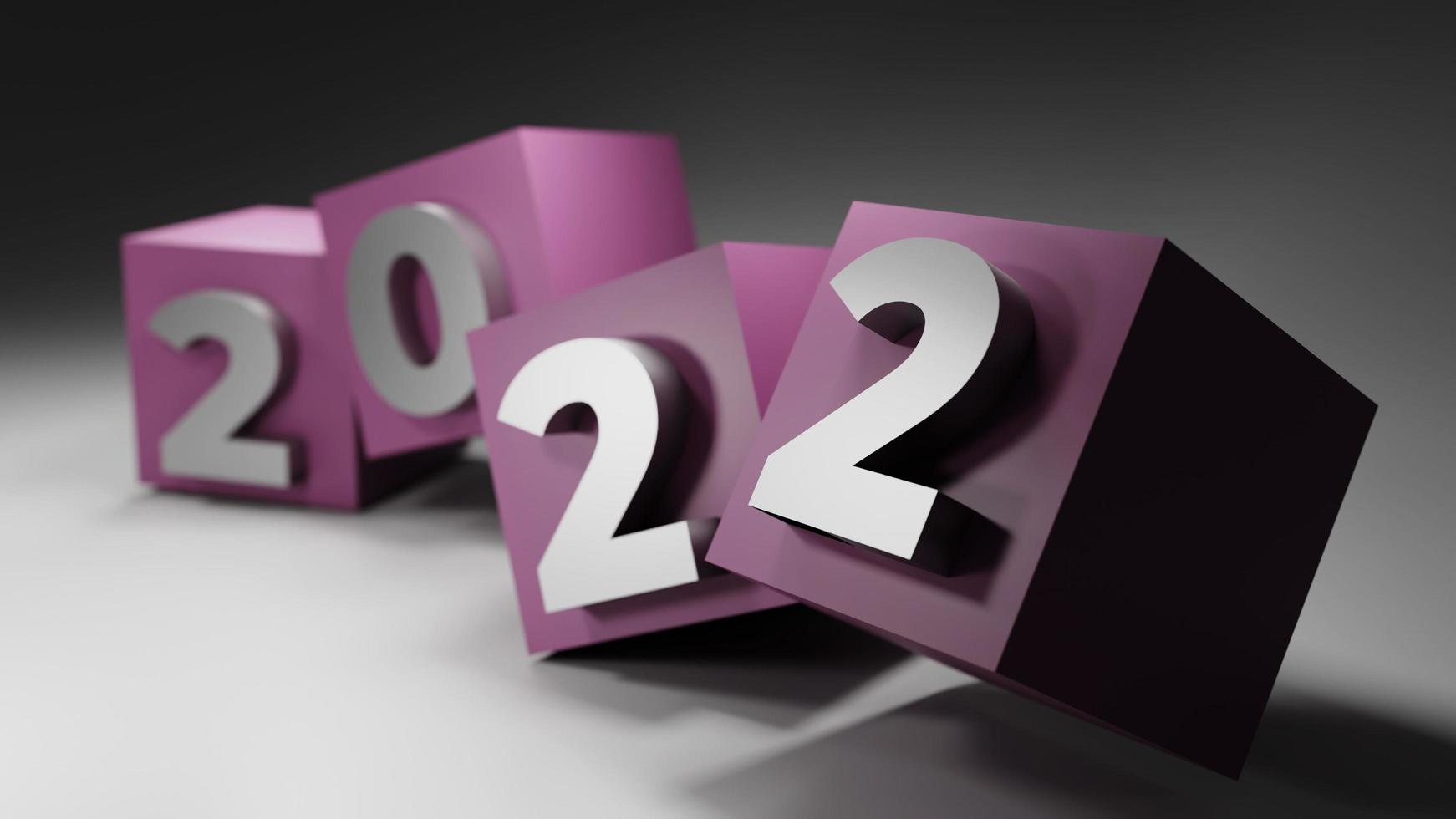 Representación 3D posición aleatoria año nuevo 2022 en cubo rosa con fondo gris foto