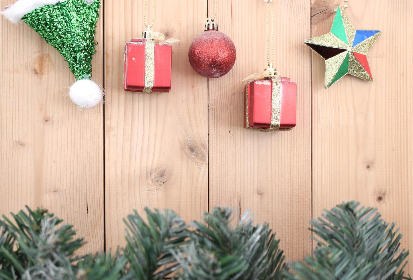 christmas background with decorations on wooden board photo