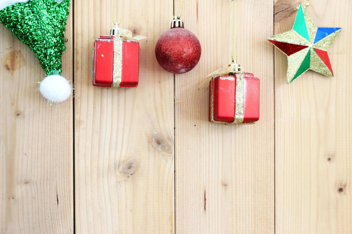 christmas background with decorations on wooden board photo