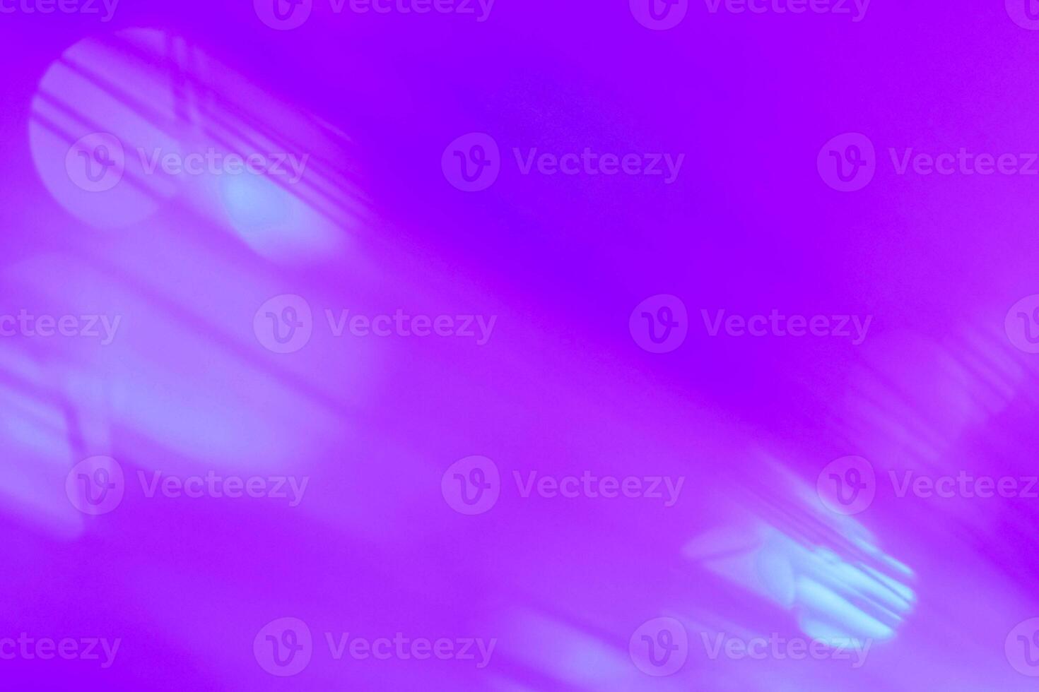 purple and blue neon light abstract Neon bright lens flare colored on black background.dark abstract futuristic background and Neon backgrounds photo