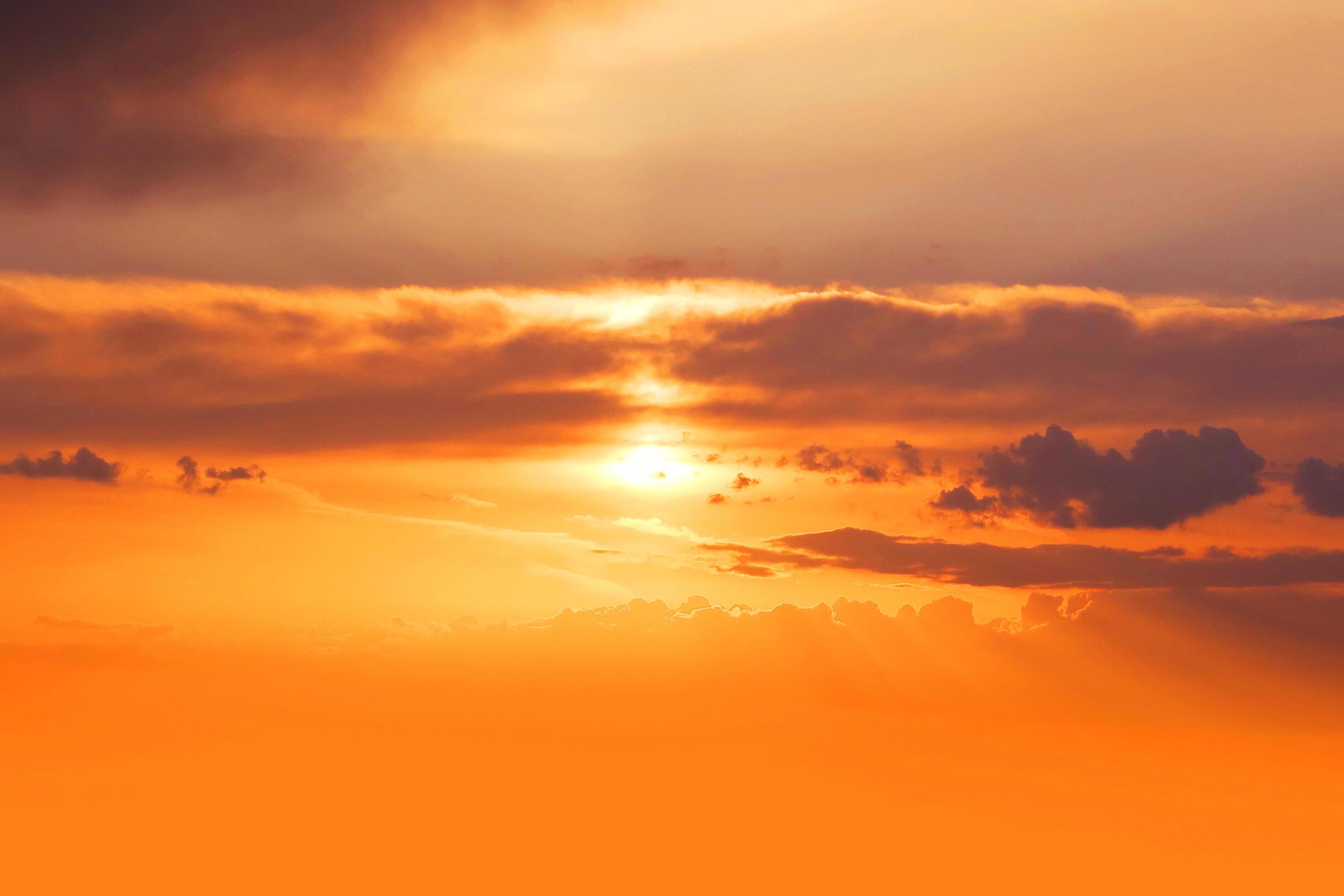 sunset and orange cloud and blue dawn sky with cloud horizontal lines  motion effect on background from sunshine. 4770331 Stock Photo at Vecteezy