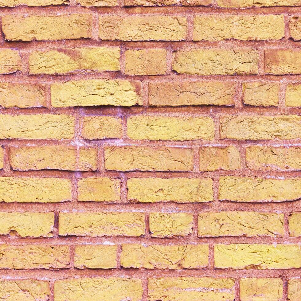 light yellow colored wall brick Abstract grunge background with distressed aged texture and brush painting photo