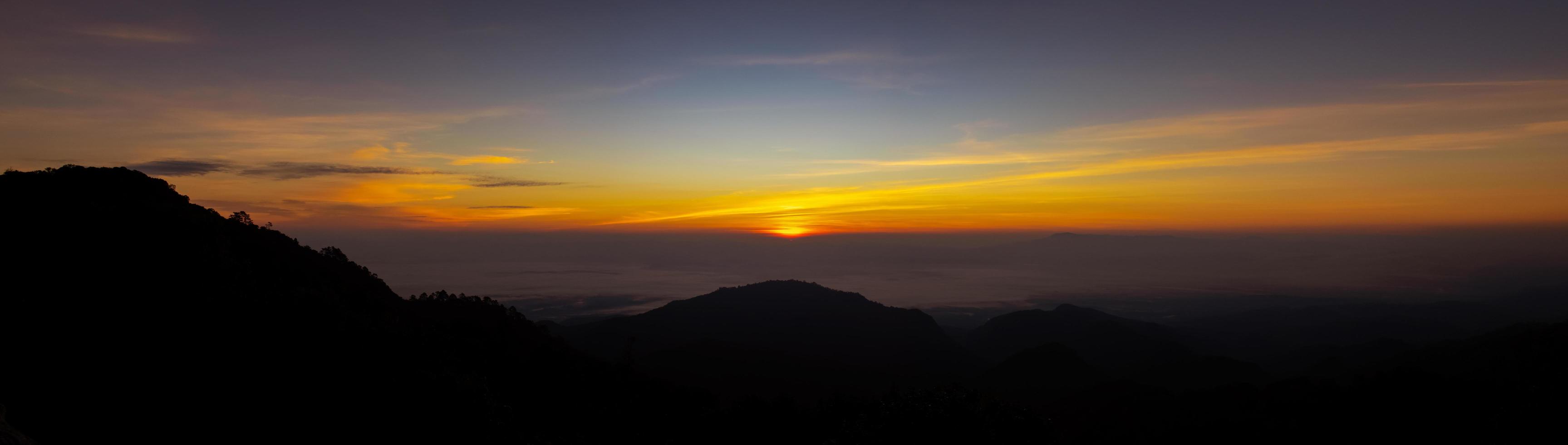 Panorama sunrise over mountains and fog, Doi Ang Khang, Chiang Mai, Thailand photo