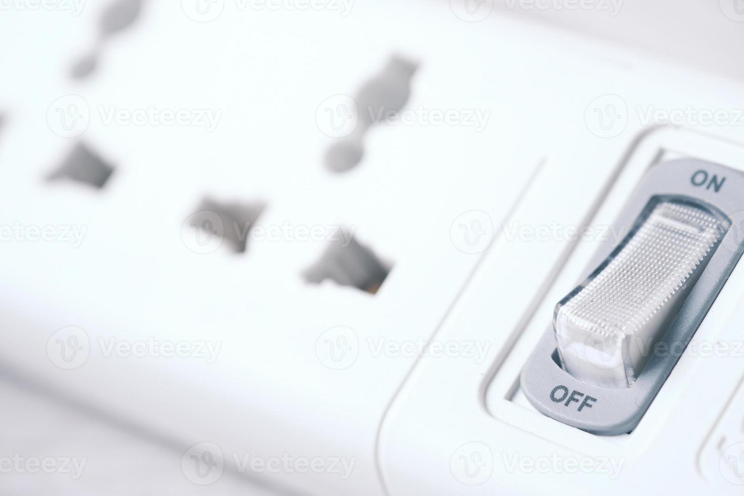 Electrical switch and plug on color background, photo