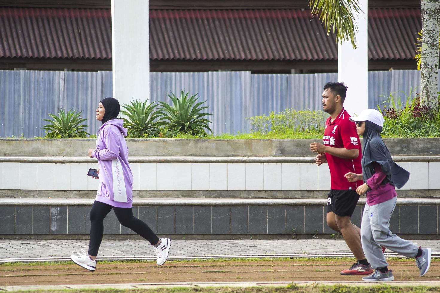 Sorong, West Papua, Indonesia, November 28th 2021. The activities at Aimas town square in Sunday morning. Jogging, playing basket ball, badminton and gym. photo