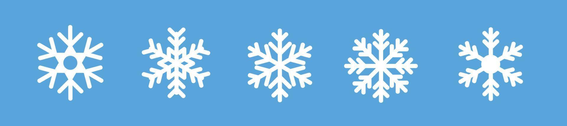 White snowflakes icons set vector. Isolated white winter snowflake symbols on blue background. Silhouette christmas snow-flake sign. Vector illustration.