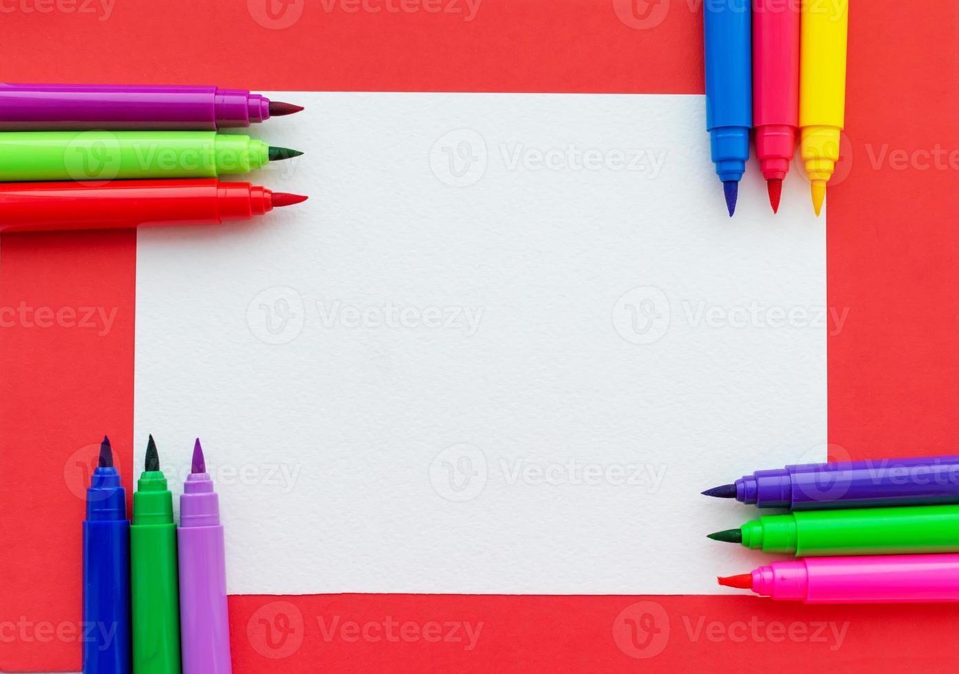 Template. Felt pens on a sheet with a place for inscription. View from above. photo