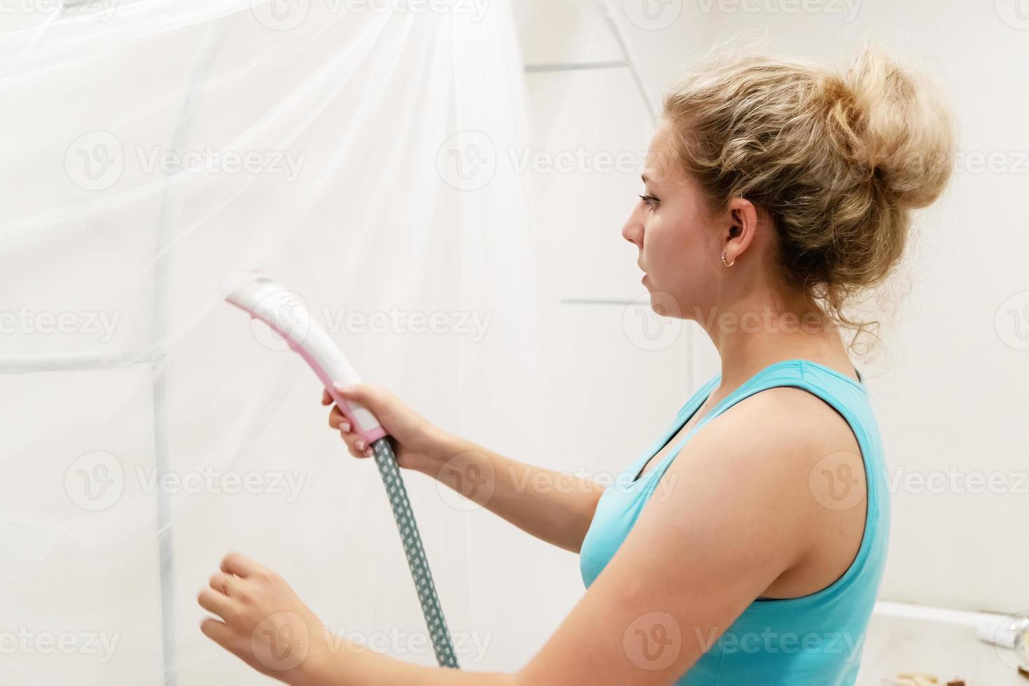 a young girl is going to wash her hair photo