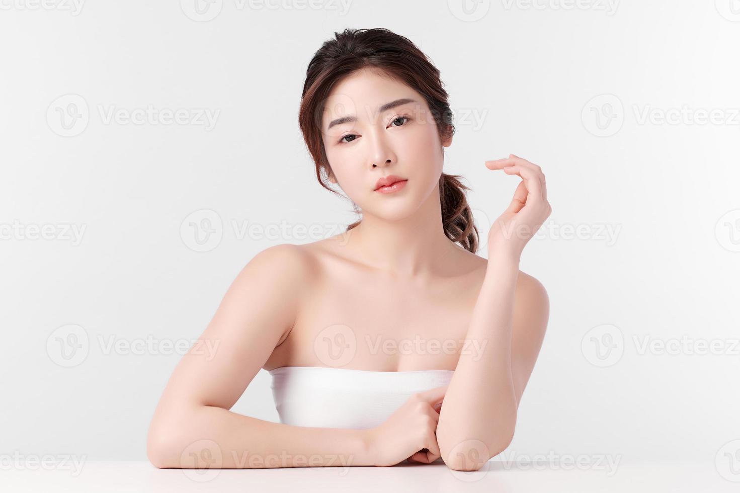 Beautiful young asian woman with clean fresh skin on white background, Face care, Facial treatment, Cosmetology, beauty and spa, Asian women portrait. photo