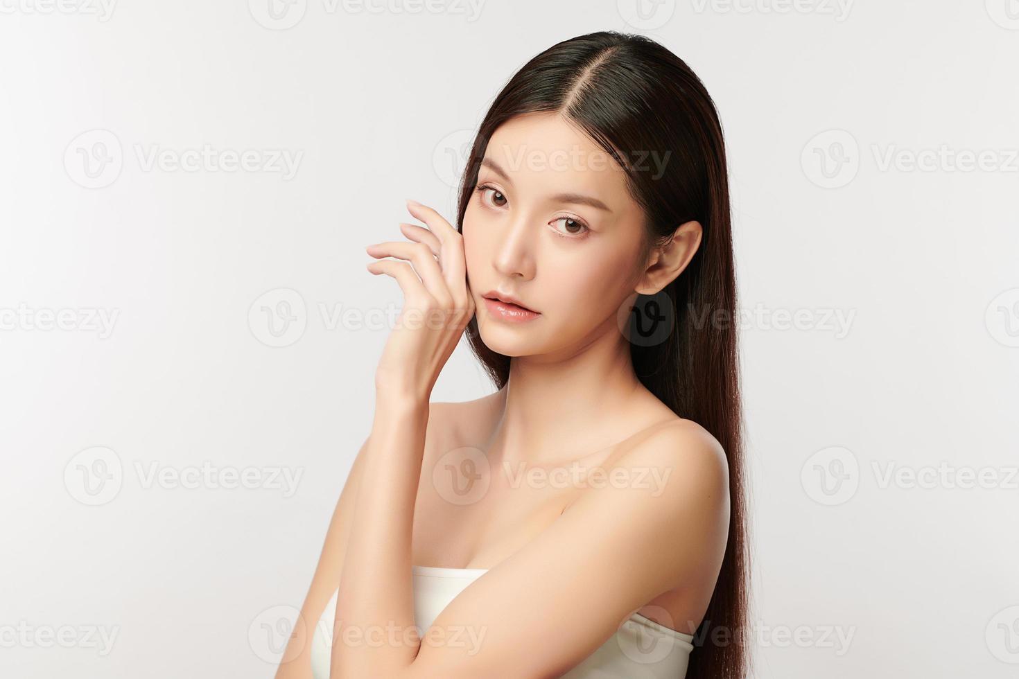 Beautiful young asian woman with clean fresh skin on white background, Face care, Facial treatment, Cosmetology, beauty and spa, Asian women portrait. photo