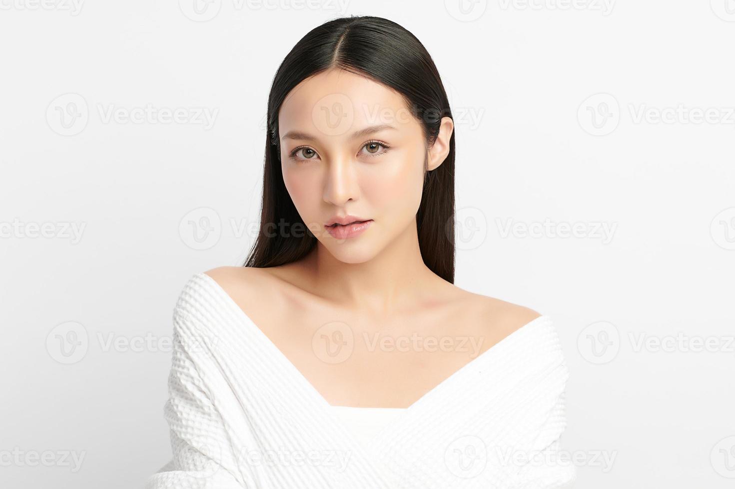 Beautiful young asian woman with clean fresh skin on white background, Face care, Facial treatment, Cosmetology, beauty and spa, Asian women portrait. photo