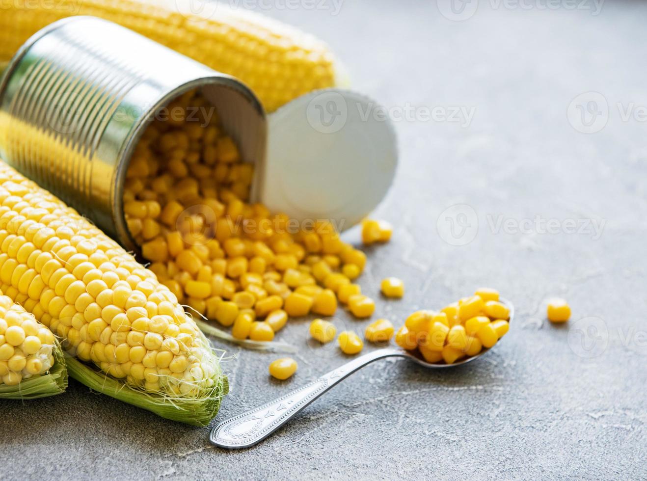 Preserves sweetcorn and raw corn photo