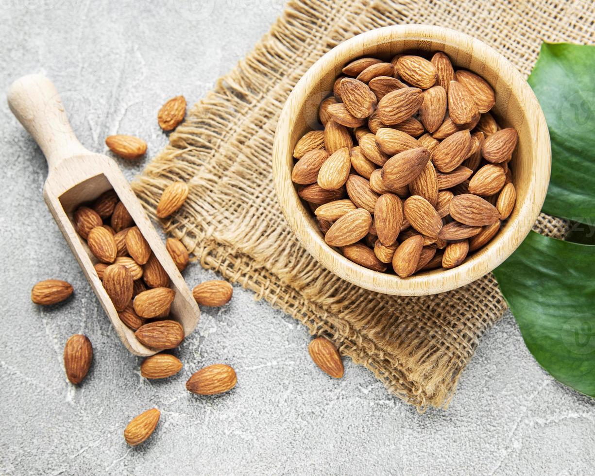 Almonds in brown bowl photo