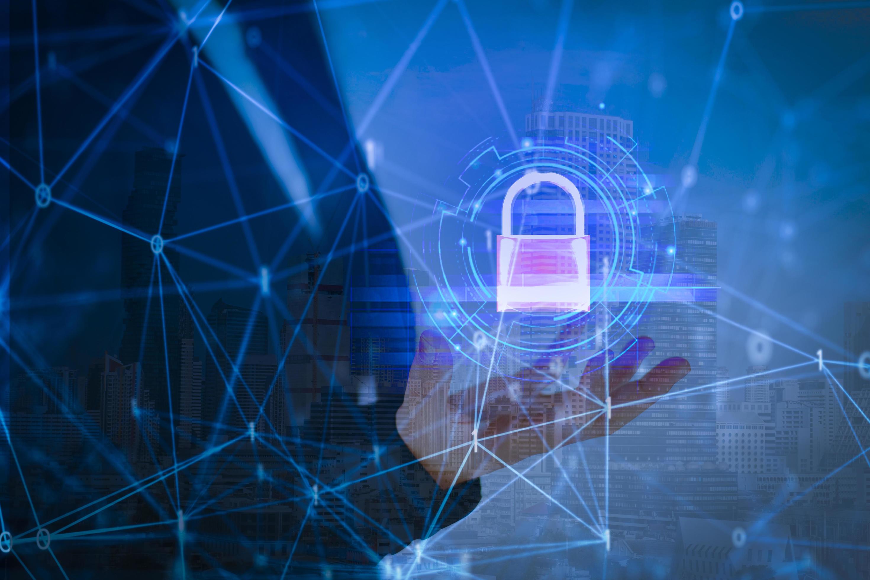 Business woman with data security systems computer with locked padlock