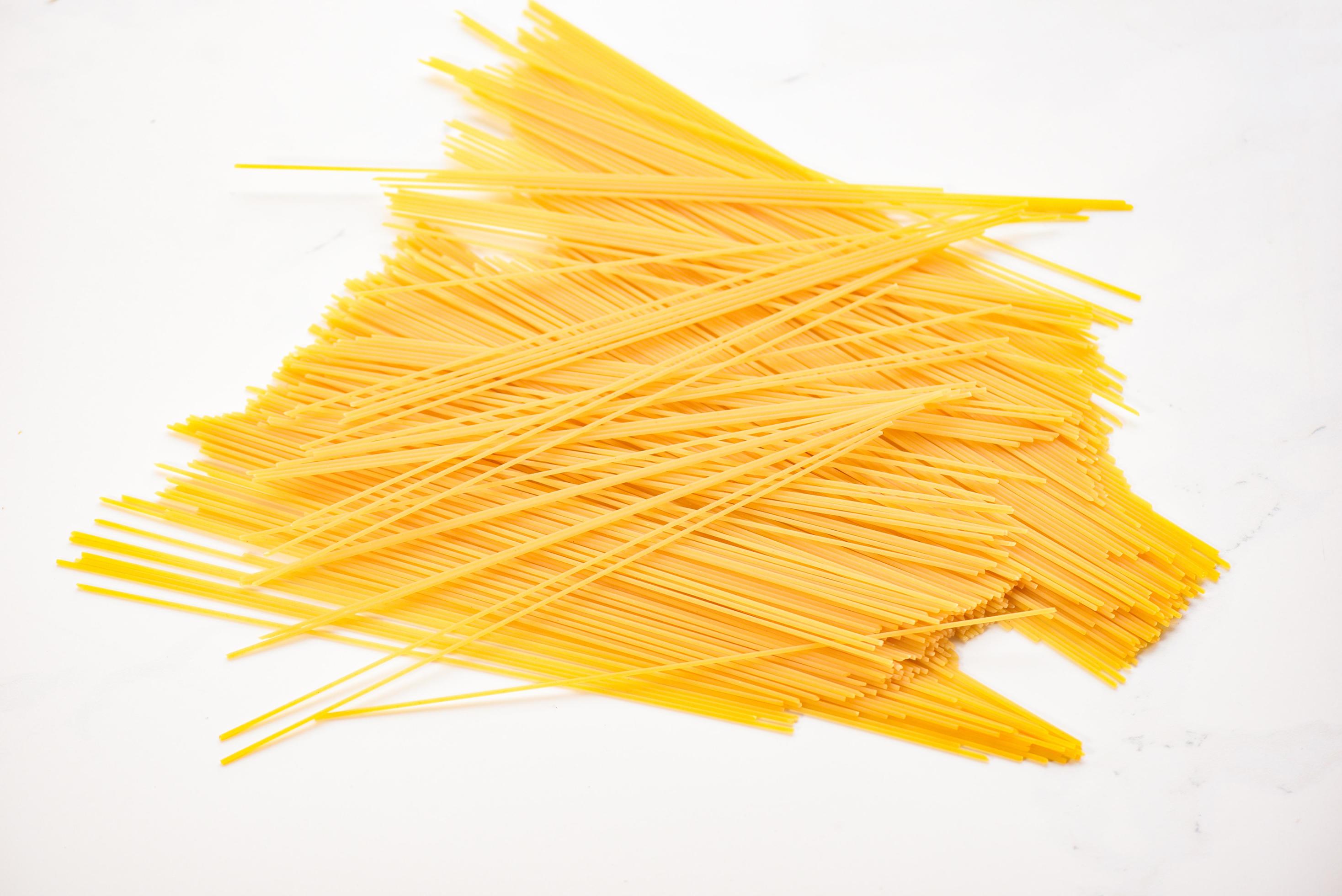 raw spaghetti italian pasta uncooked spaghetti yellow long ready to