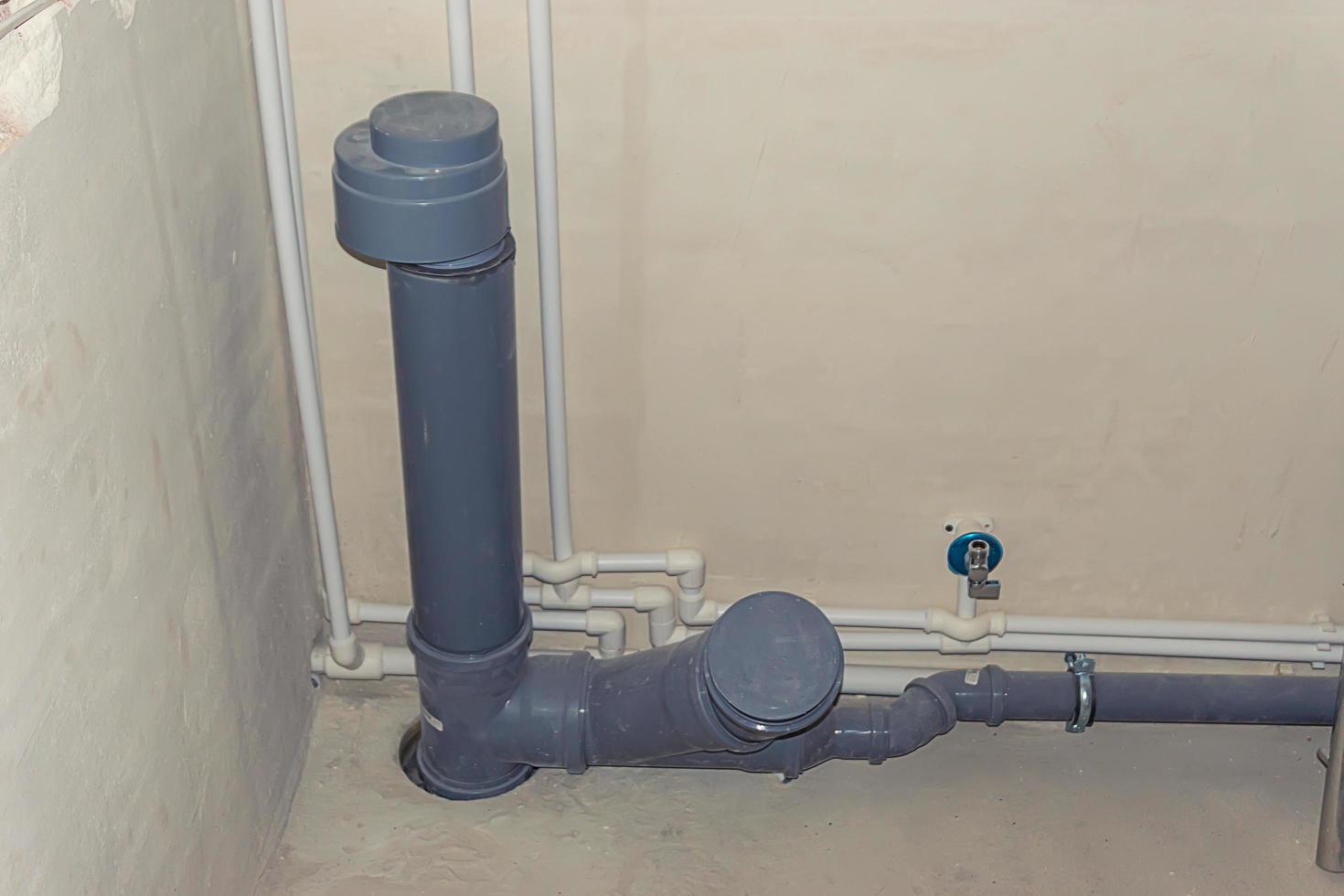 sewer pipes on building photo