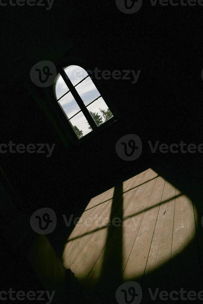 Beautiful wooden frame window in old building without people photo