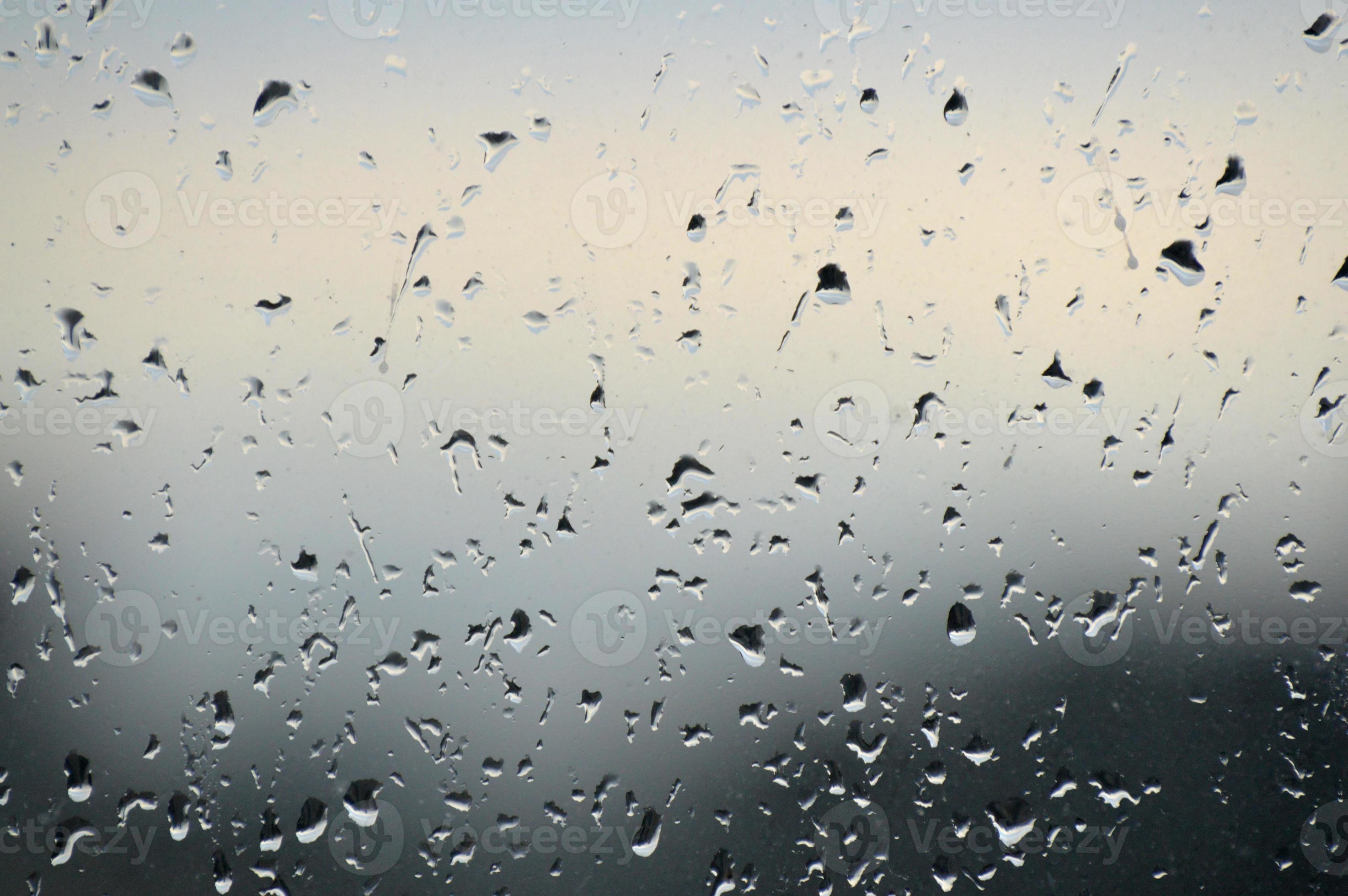 Abstract photo background. Rain drops on window. Selective focus, rainy  city background. Water drops on glass. Rainy weather, blur wallpaper  4805637 Stock Photo at Vecteezy