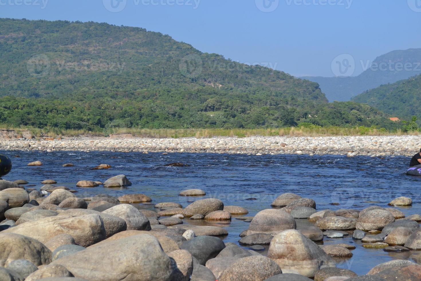 Mountains landscape. stones on the river colorful picture photo