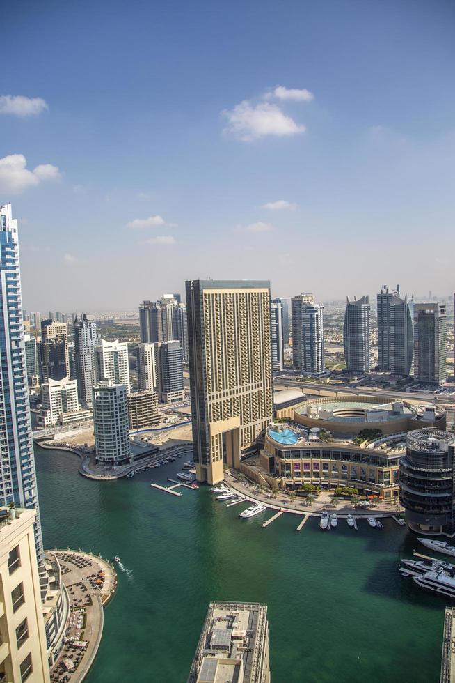 DUBAI, UAE, 2014 - View at modern skyscrapers in Dubai Marina in Dubai, UAE. When the entire development is complete, it will accommodate more than 120,000 people. photo