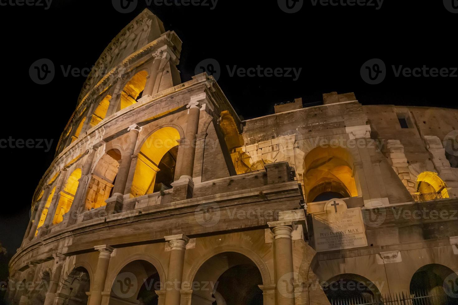 Night view at Colosseum in Rome, Italy photo