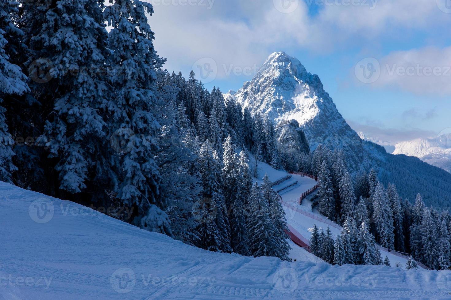 Ski slopes with a view on majestic alpine peak in Garmisch partenkirchen photo