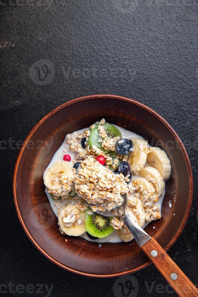 oatmeal berries oat flakes breakfast porridge vegan or vegetarian food photo