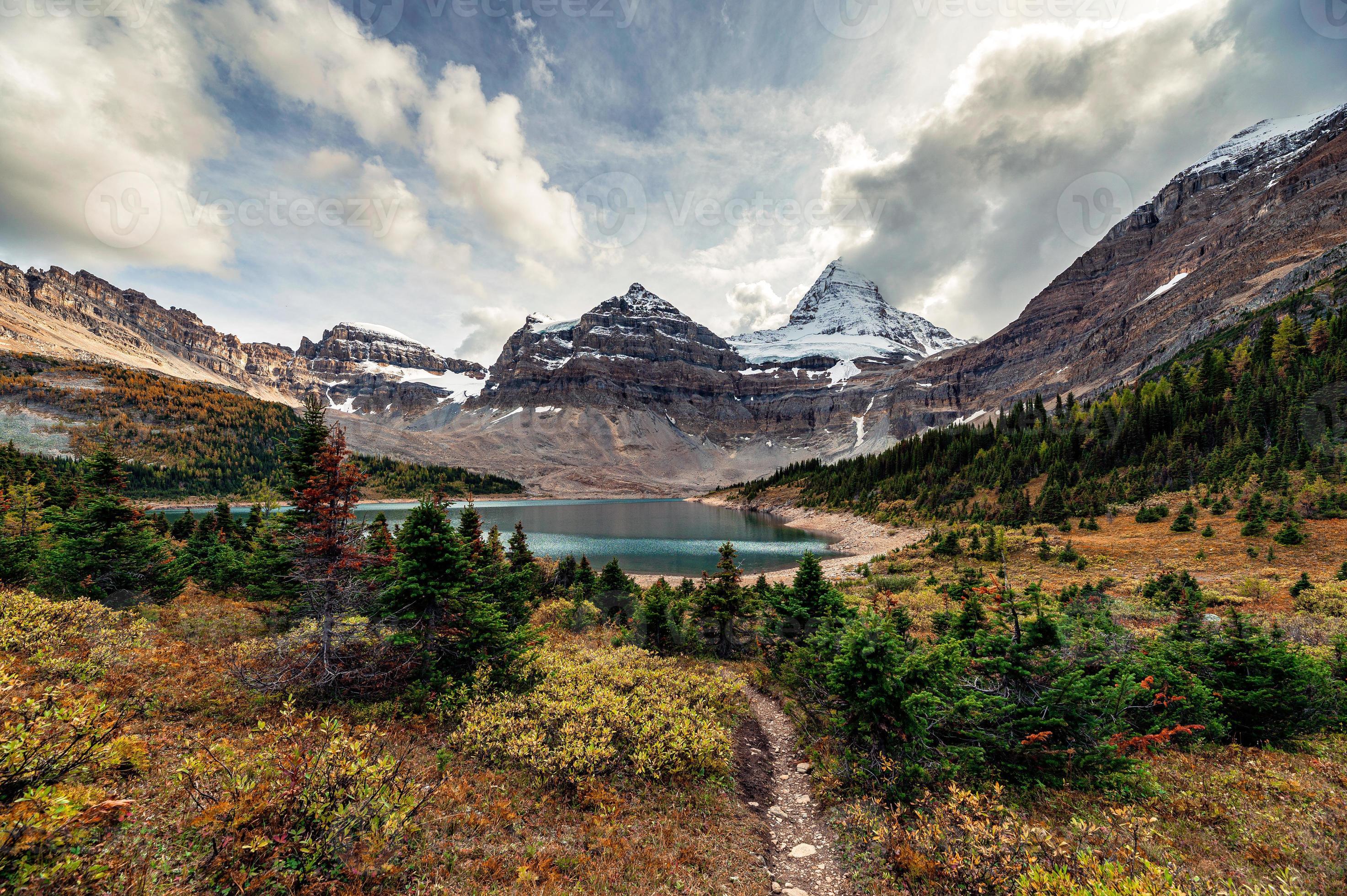 Mount Assiniboine With Autumn Forest At Lake Magog On Provincial Park