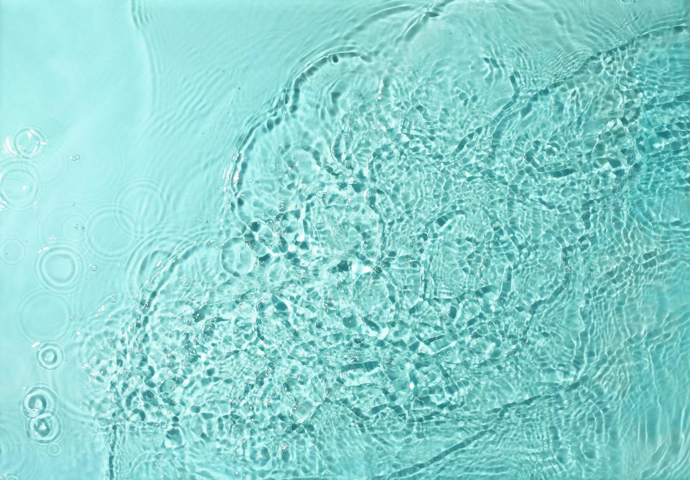 texture of splashing water on pastel background photo