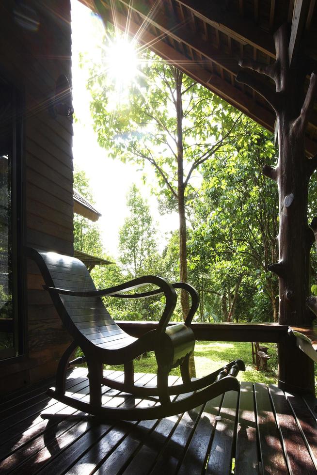 wooden armchair in natural light photo