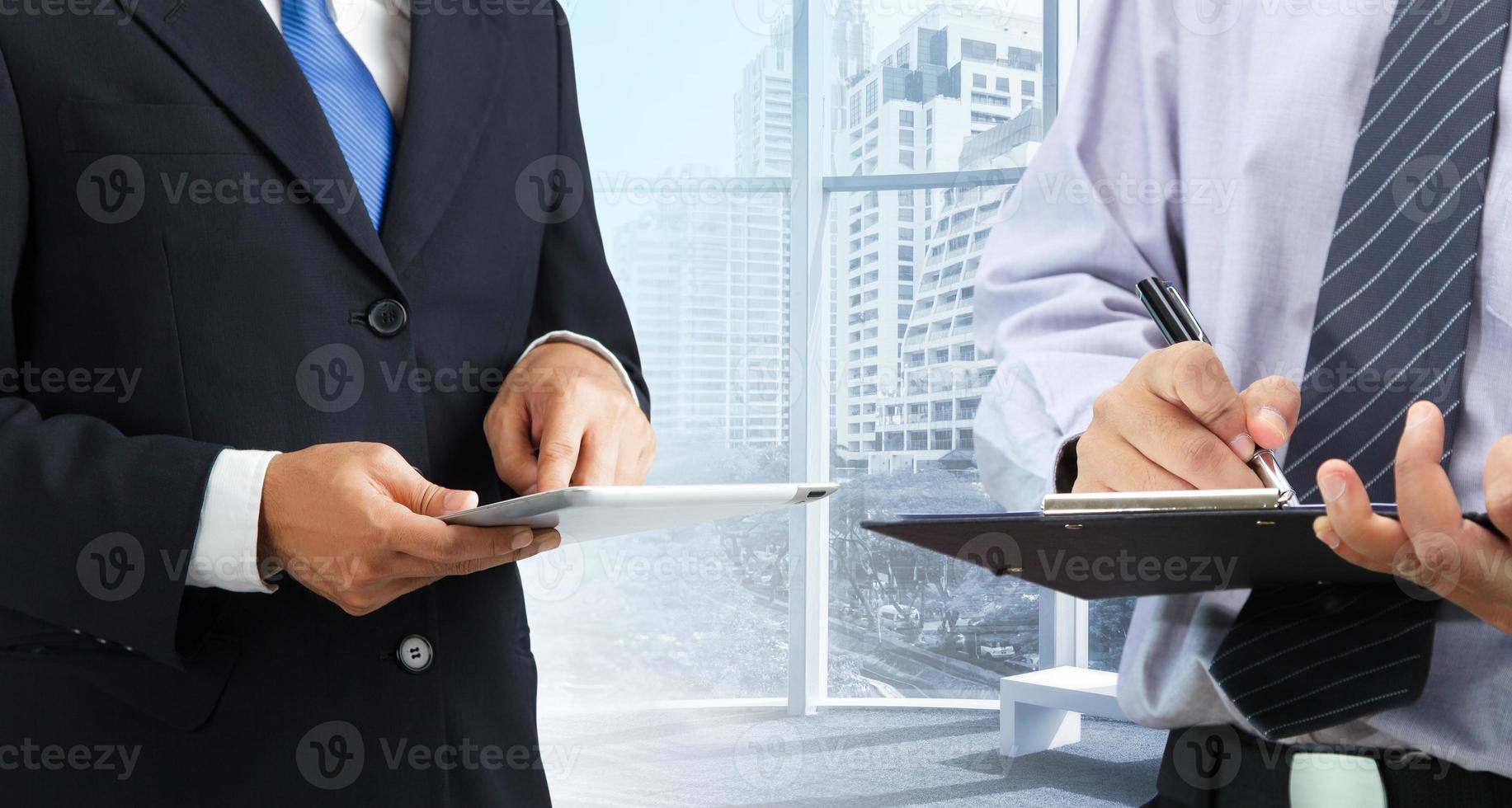 Businessman using tablet photo
