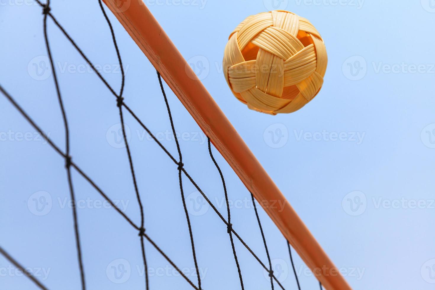 Sepak takraw ball and the net photo