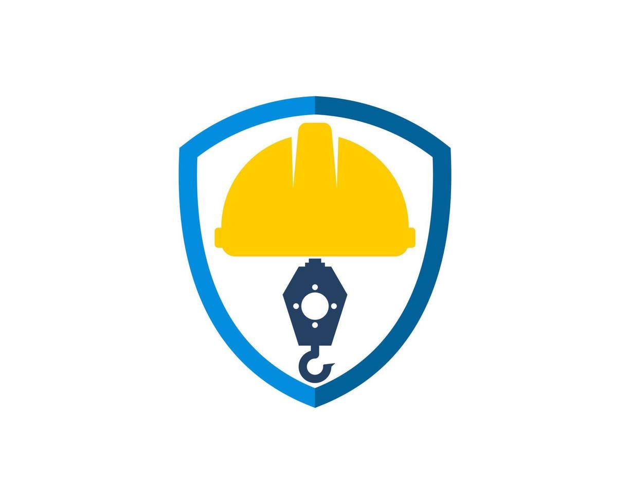 Simple shield with safety helmet and crane inside vector