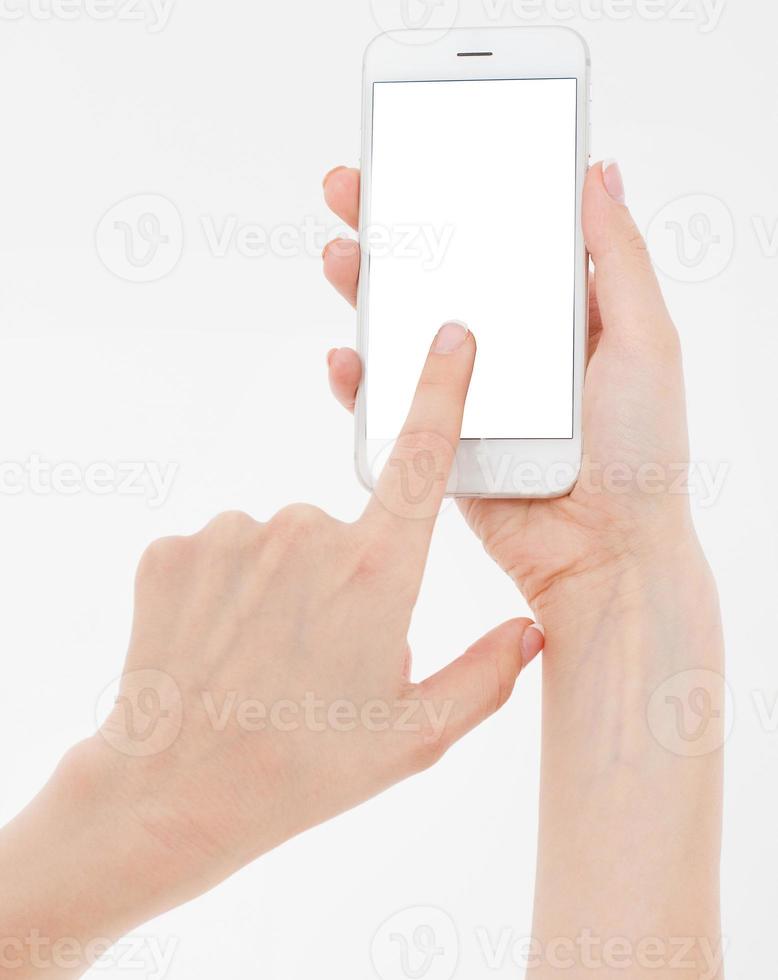 female hand hold mobile phone isolated on white, woman holding phone with empty display,blank screen,touching photo