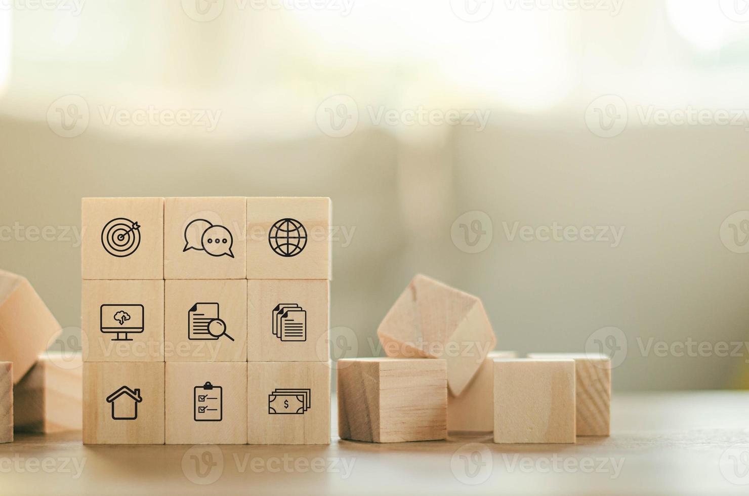 business strategy with wooden blocks and business finance vikon action plan goals and goals Stack on the table about business strategies and action plans. photo