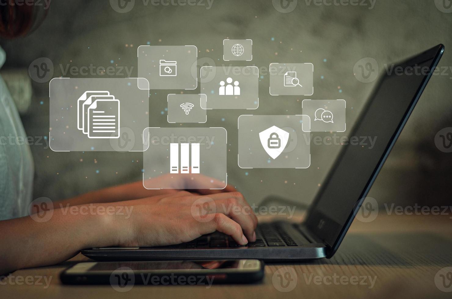 a business woman using a computer to manage documents online document evidence digital file storage system, software along with record keeping database technology file access document sharing photo