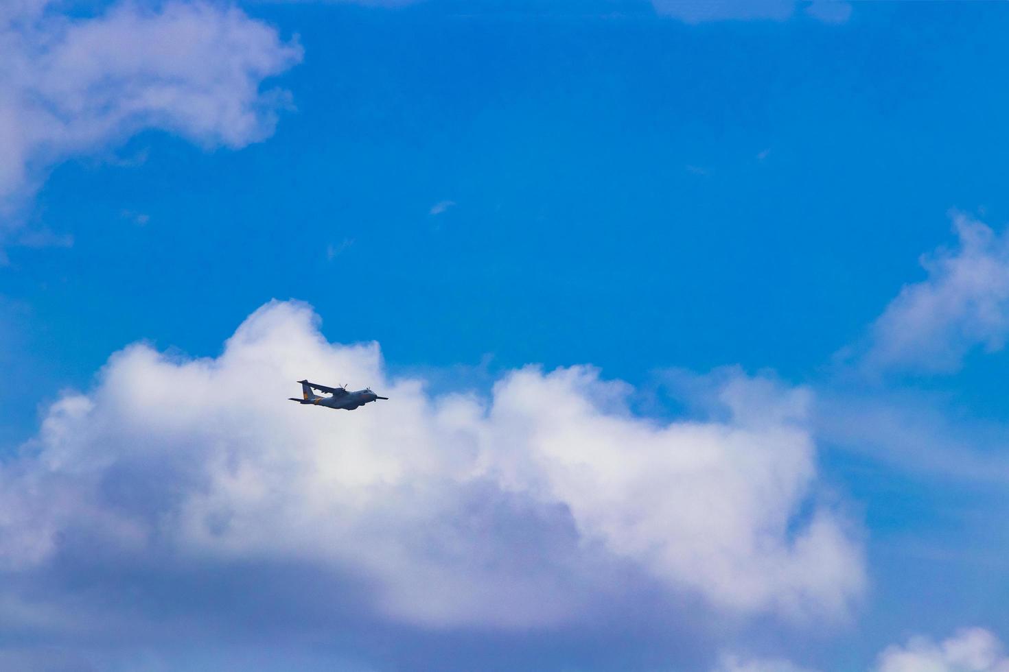 Airplane flies above the clouds in Mallorca Spain. photo