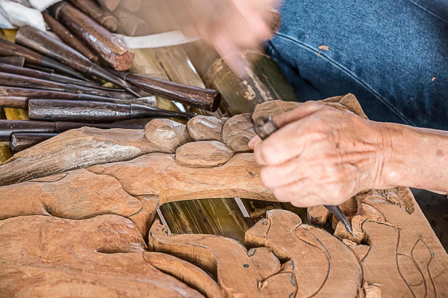 Craftsman wooden carving. photo