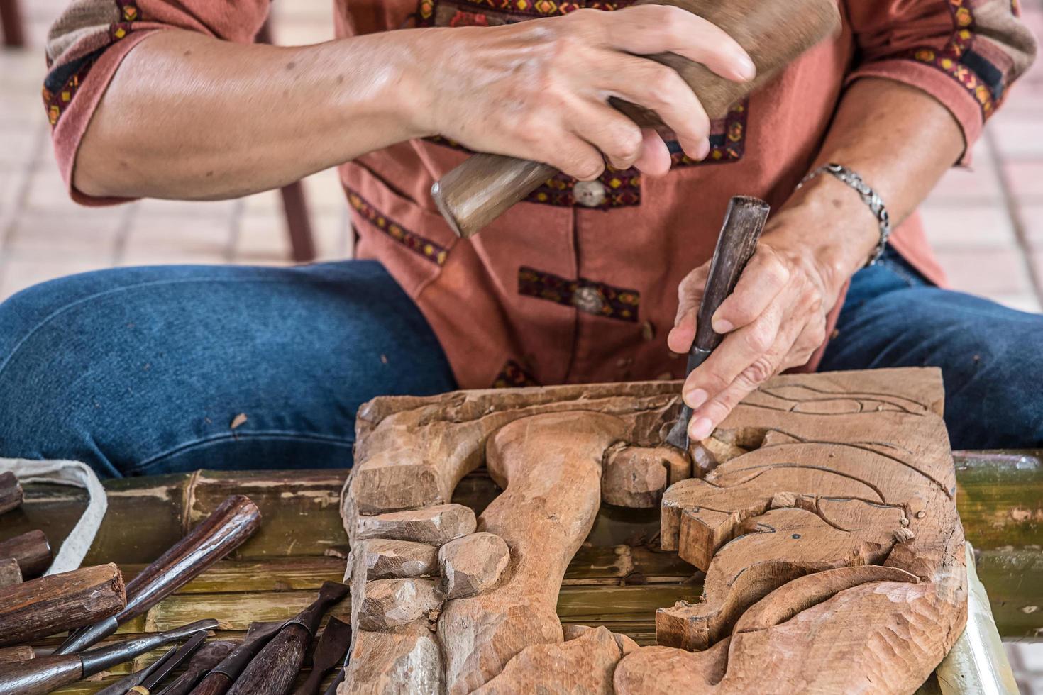Craftsman wooden carving. photo