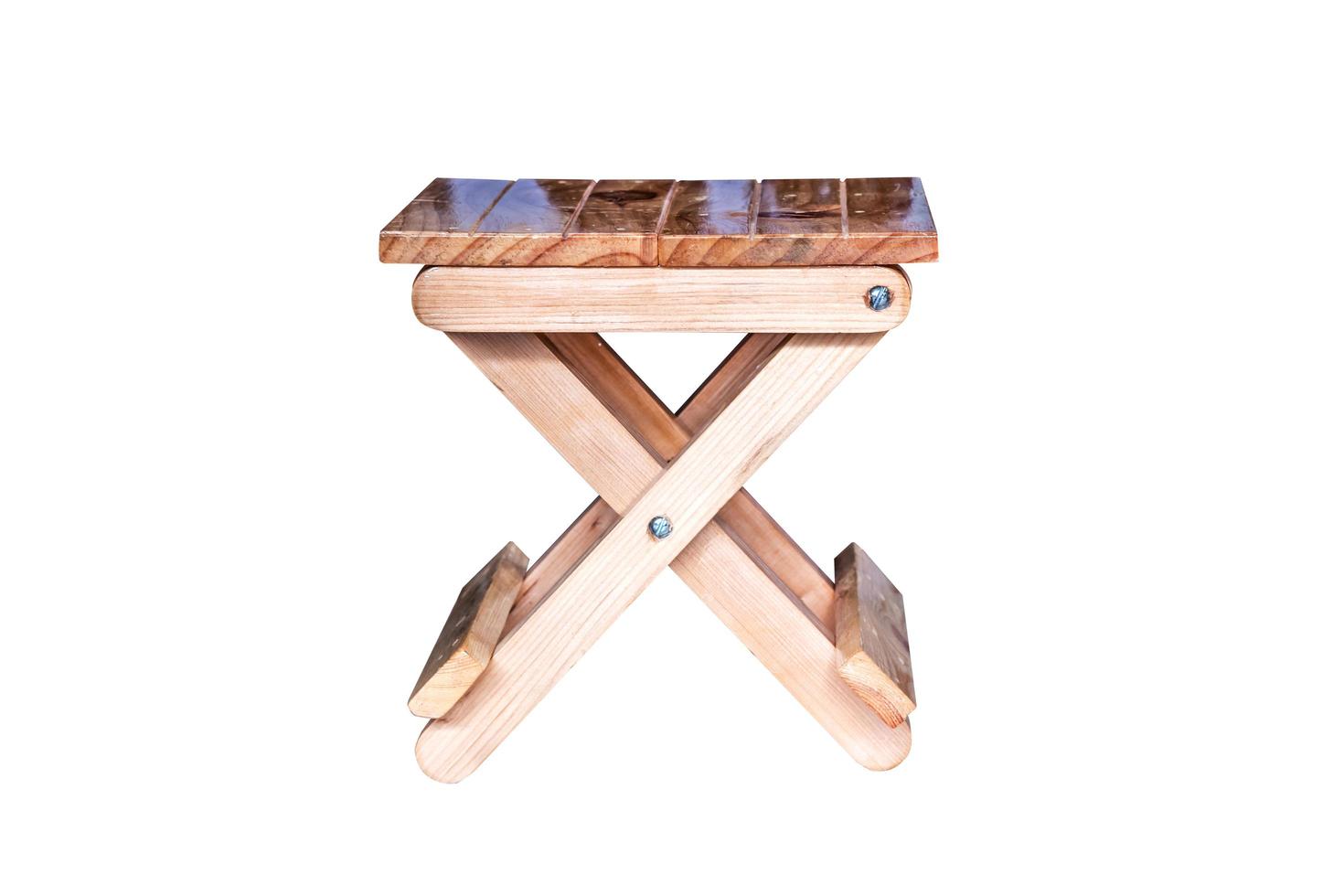 Small wooden folding stool. photo