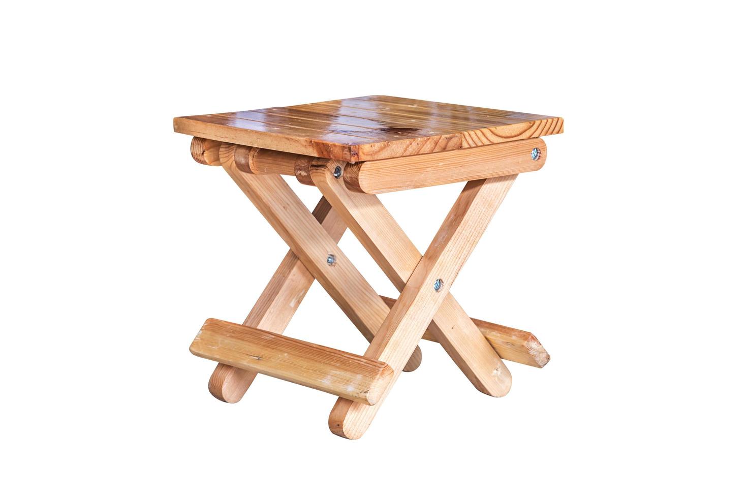 Small wooden folding stool. photo