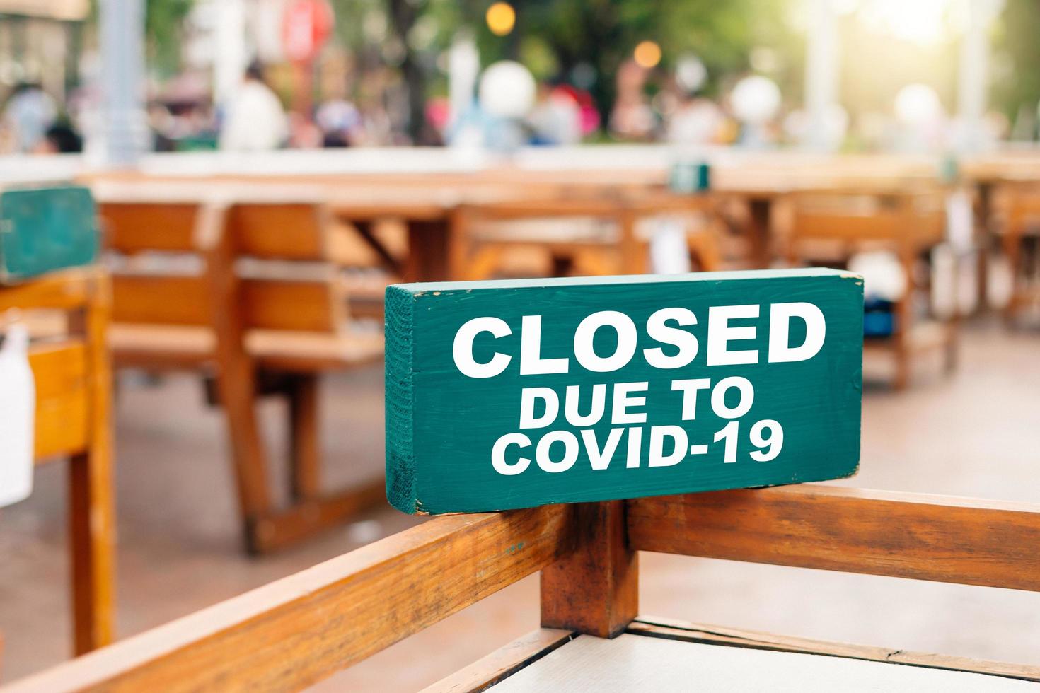 The restaurant sign tells customers that the store is closed because of coronavirus photo