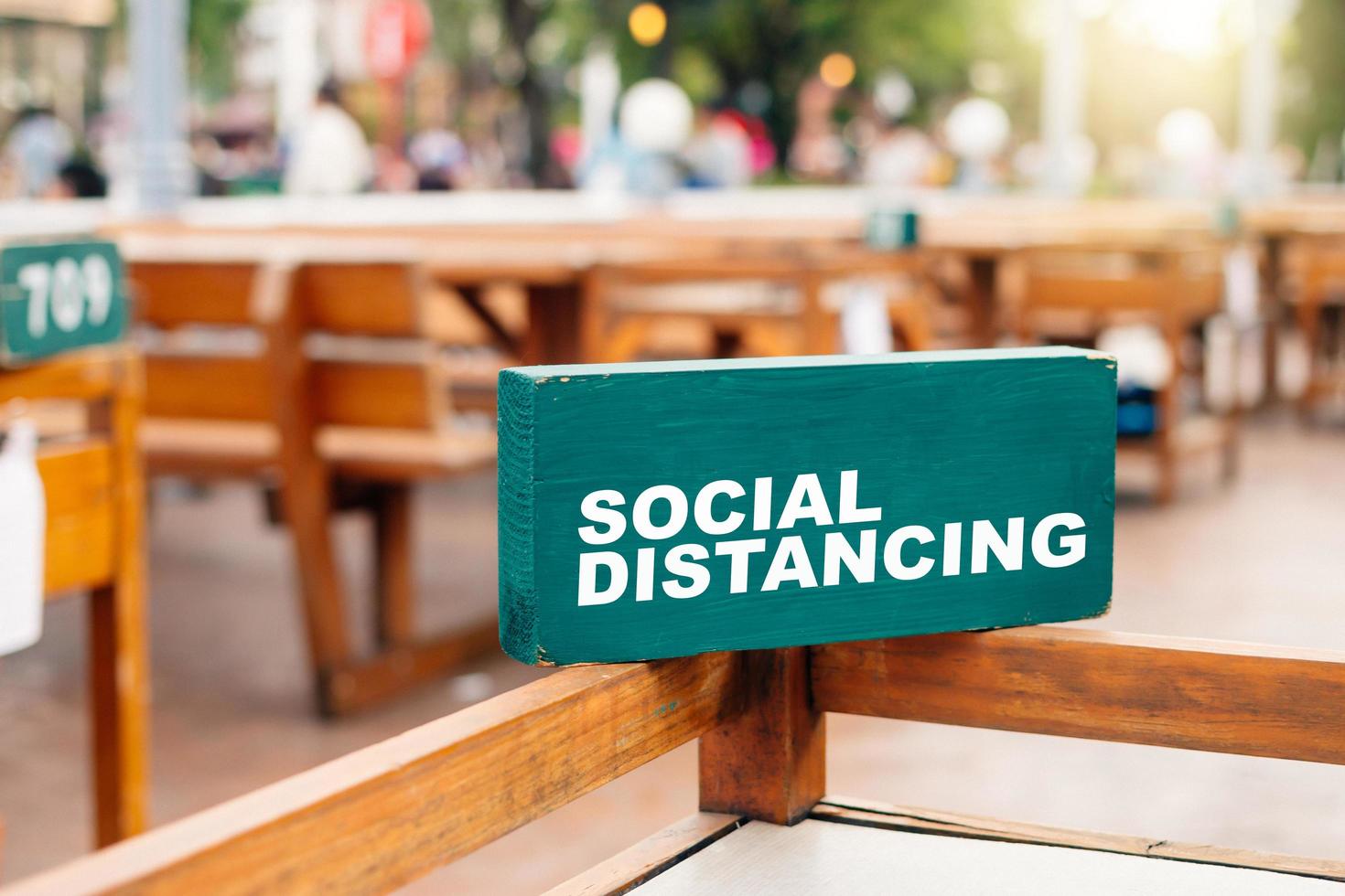 Signs in restaurants tell customers to take social distances because of the COVID-19 situation. photo