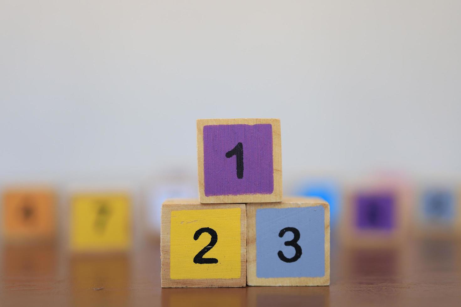 Wooden blocks with numbers, The concept of being a winning person and being a chosen person. photo