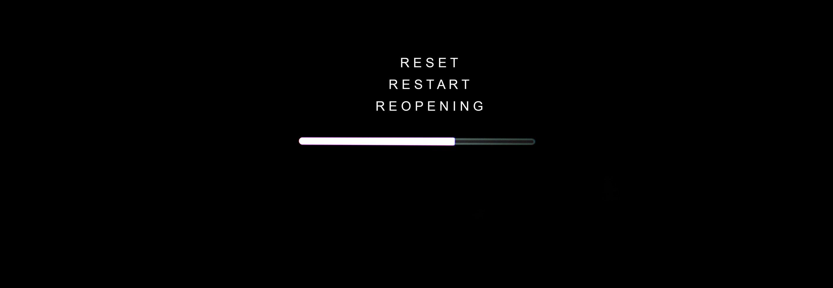 RESET, RESTART and REOPENING concept, Loading sign on black computer screen photo