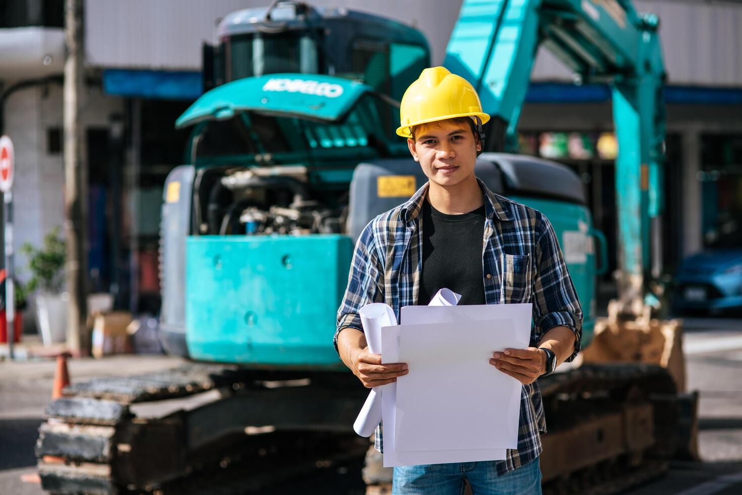 Civil engineers work on large road and machinery conditions. photo