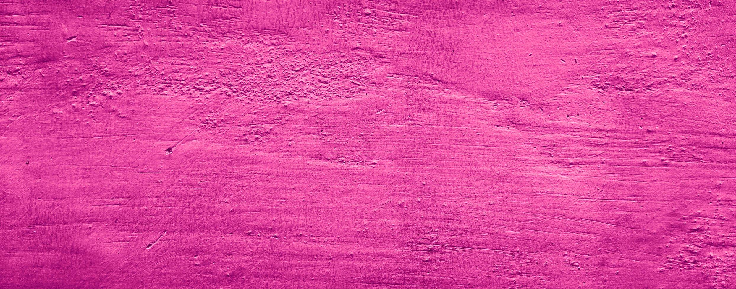 Fondo de textura de pared de hormigón abstracto de color sólido rosa púrpura foto