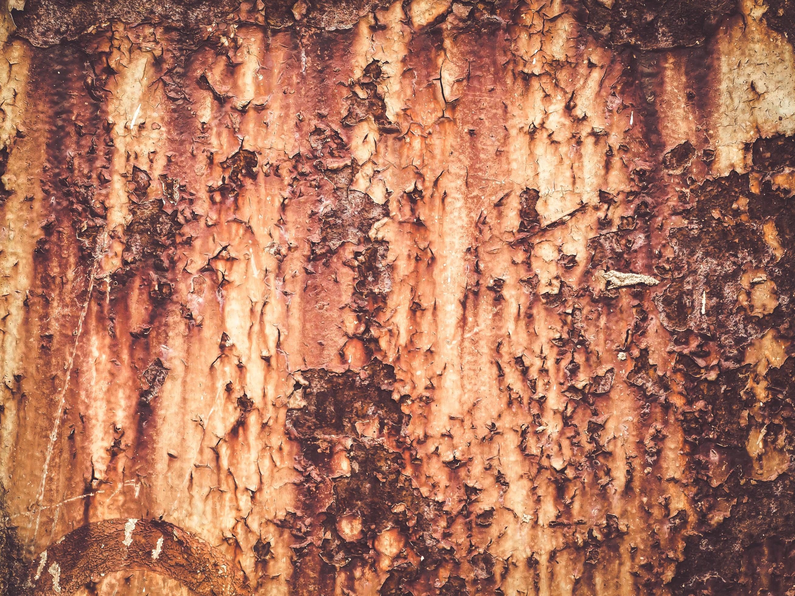 Rust Metal Decayed Crumpled Sheet Wide Background. Weathered Iron Rusty