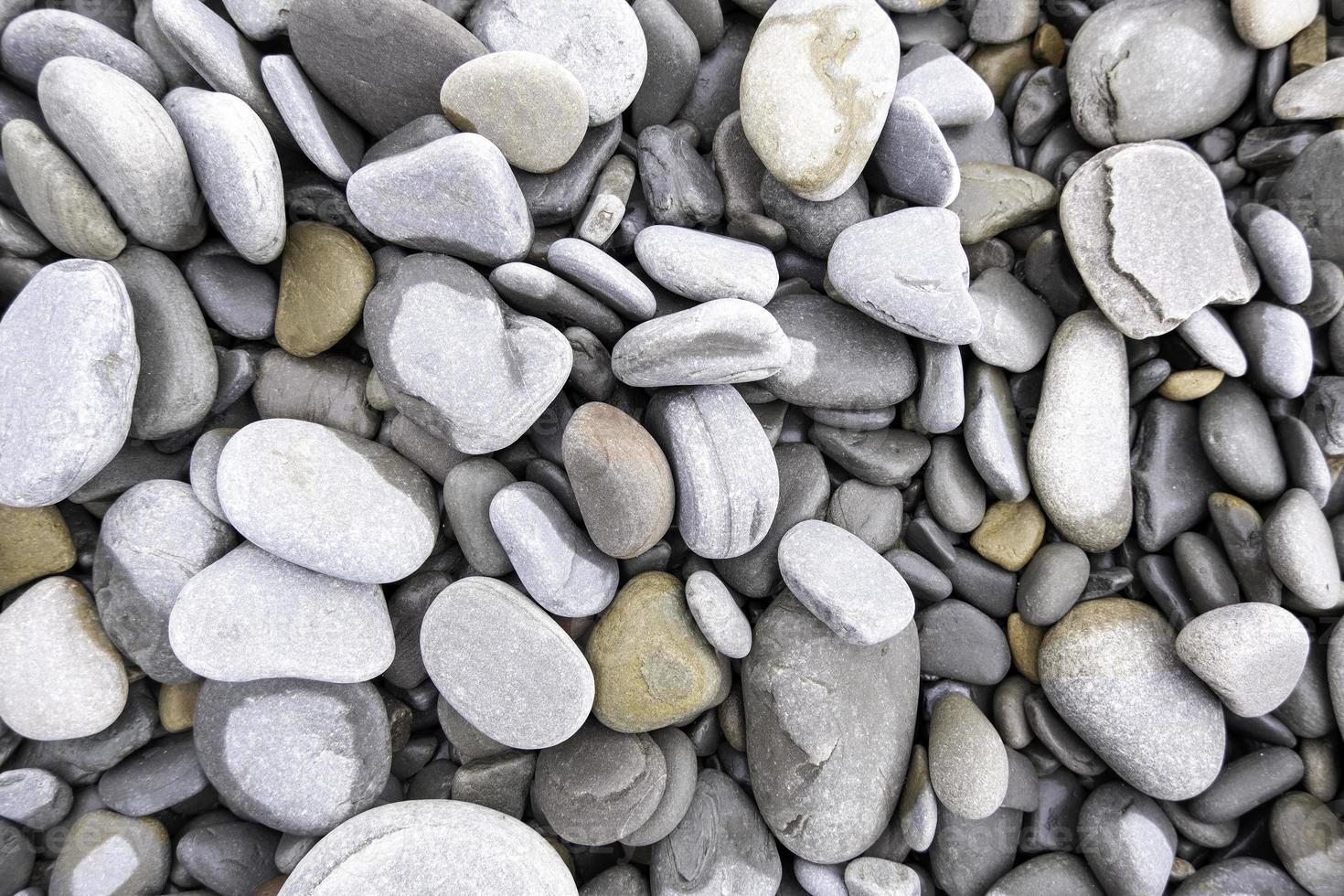 Detalle de piedras de cantos rodados foto